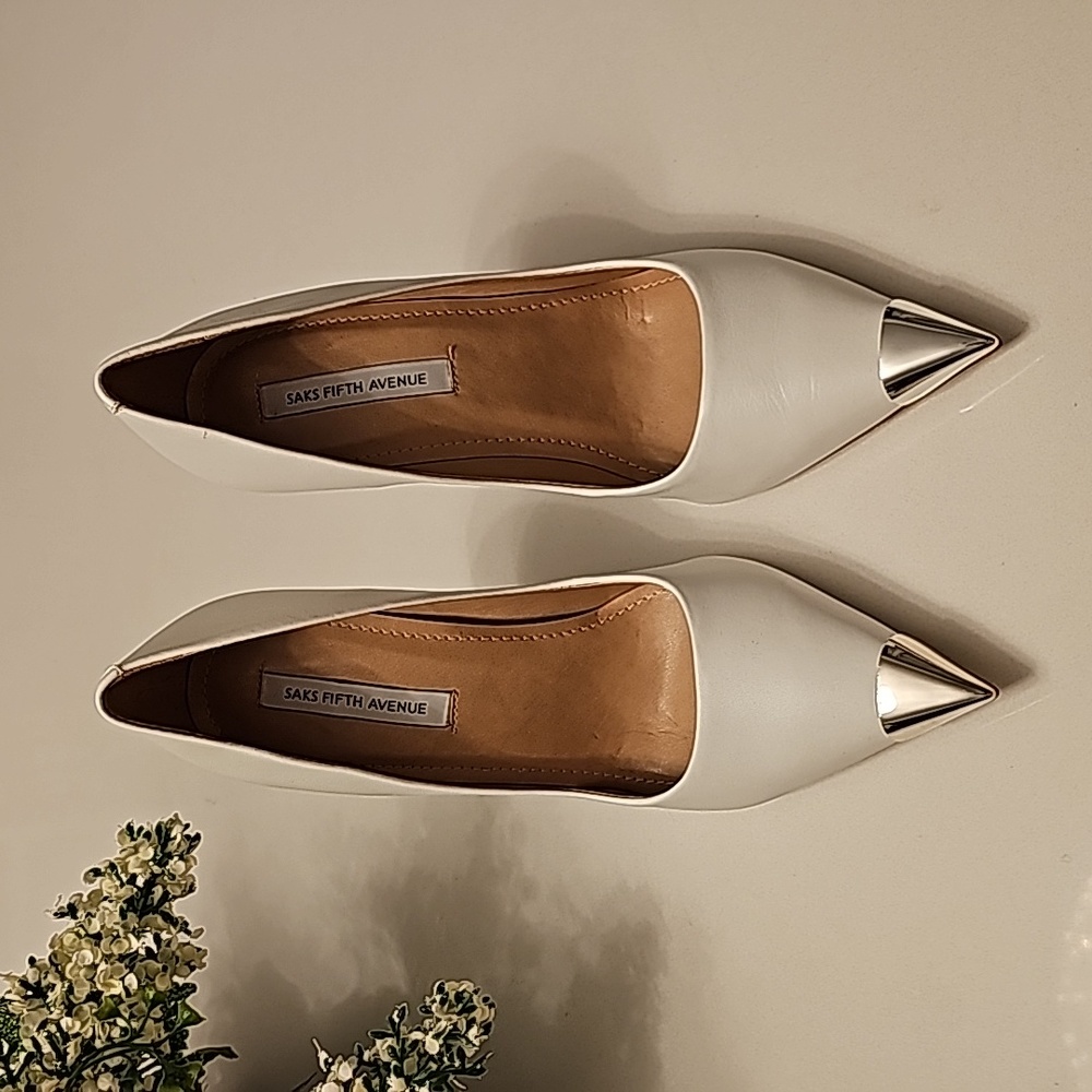 Saks white leather pumps